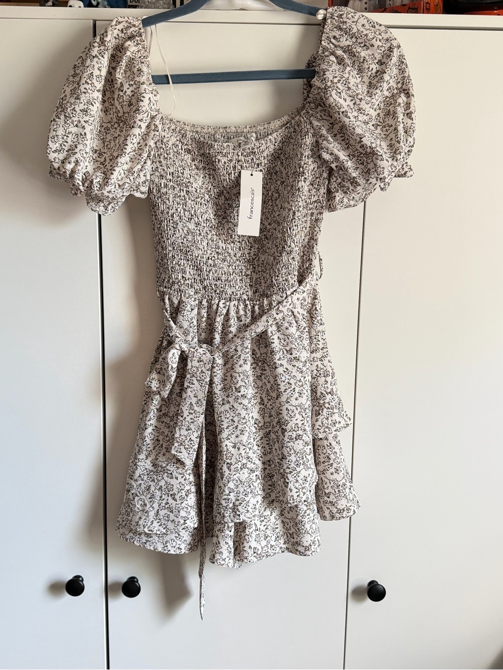 Francesca's Cream Floral Smocked Romper